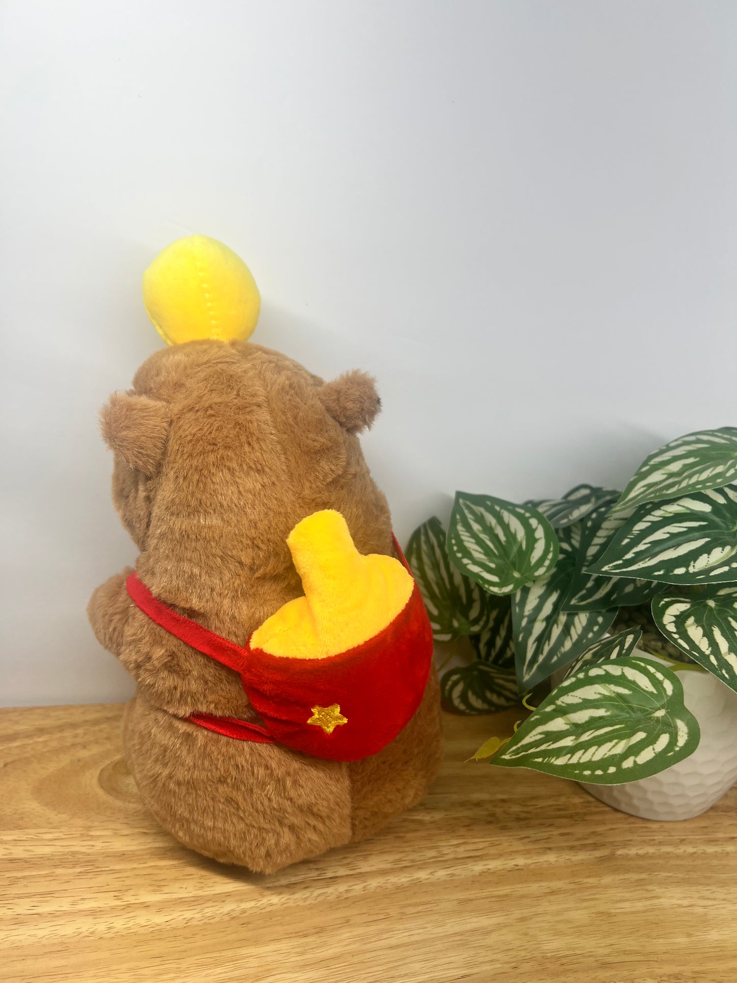 Capybara with red backpack